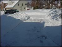 2 men, 2 hours, one single carwidth path down our new driveway